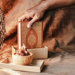 a person reaching for a box of food